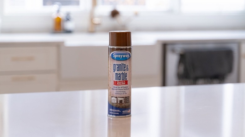 A can of Sprayway Granite & Marble Cleaner & Polish sitting on a kitchen counter