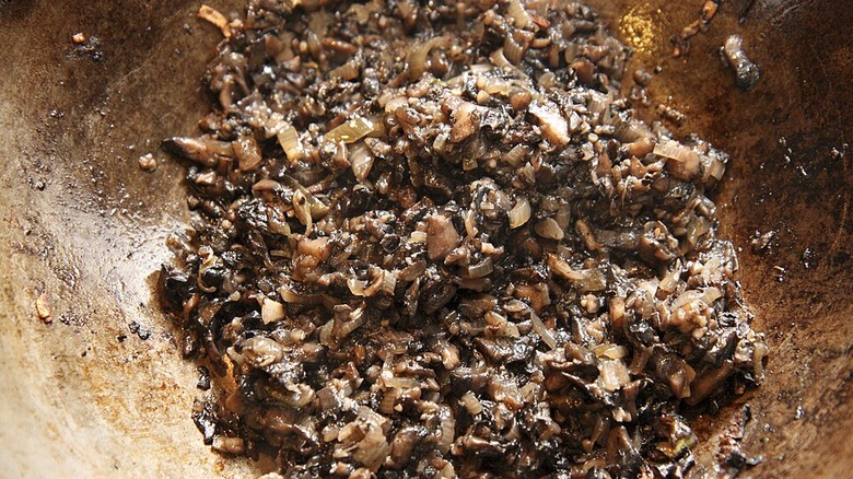 Mushroom duxelles misture in pan