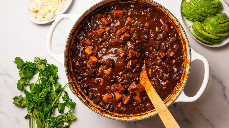 A pot of mole turkey and sweet potato chili
