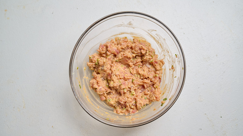 tuna mixed with mayo and sriracha in a bowl