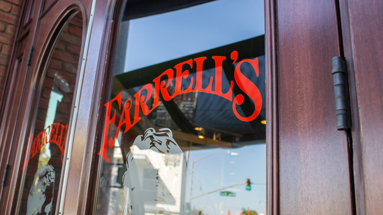 A glass door that reads Farrell's
