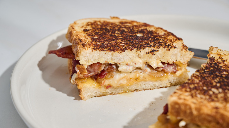 halved grilled cheese on a plate