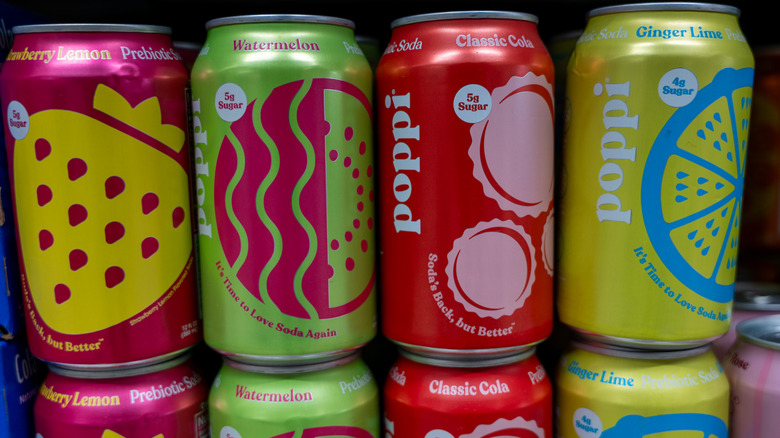 Poppi soda cans in a row