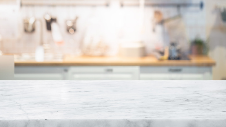 Ambrosia White granite countertop in the foreground, background blurred