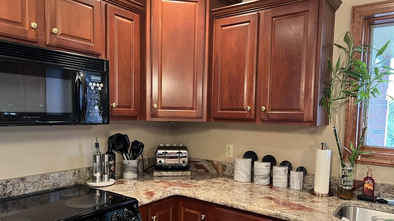 Rose Gold granite countertops in a kitchen with mahogany cabinetry