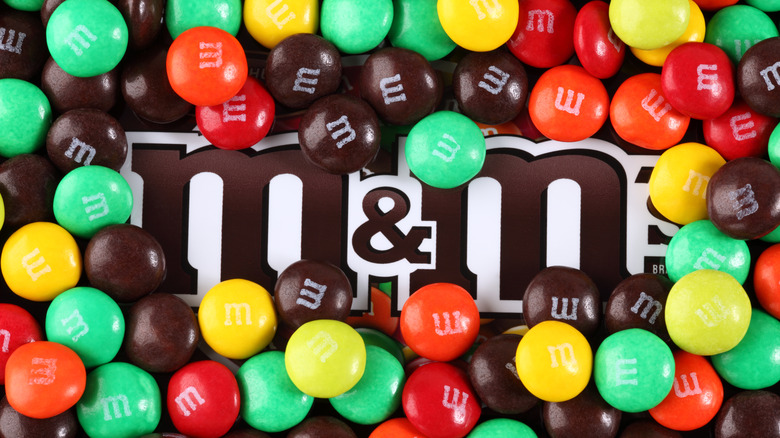 Individual M&Ms on top of bag